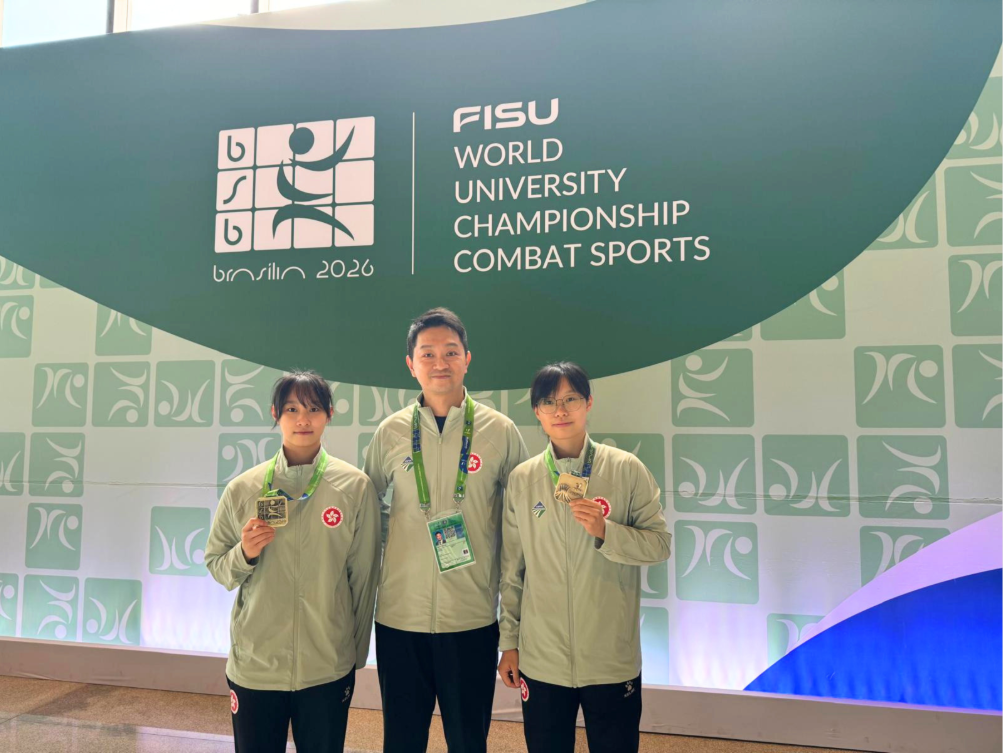 TSANG Cho Kiu (left) clinches the gold medal in the Women's Nandao event, while LEE Suet Ying (right) clinches the gold medal in the Women's Nanquan event at the 2026 FISU World University Championship Combat Sports. Head of Delegation Mr. Kilo Wong (centre) is pictured.